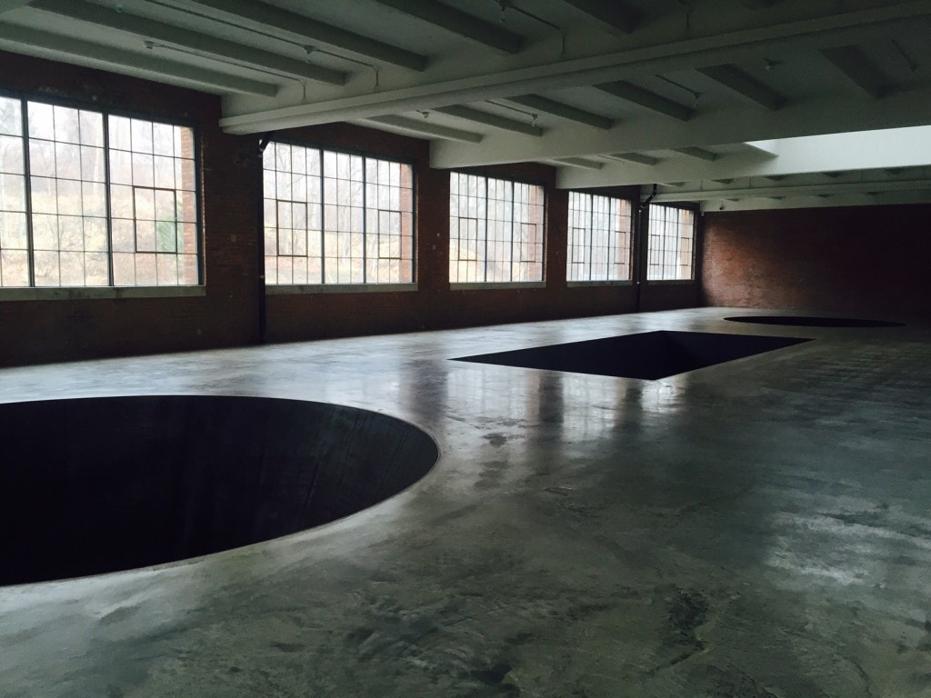 Michael Heizer's "North, East, South, West." The holes are 20 feet deep! - Beacon, NY Day Trip for World Class Contemporary Art - Two Traveling Texans
