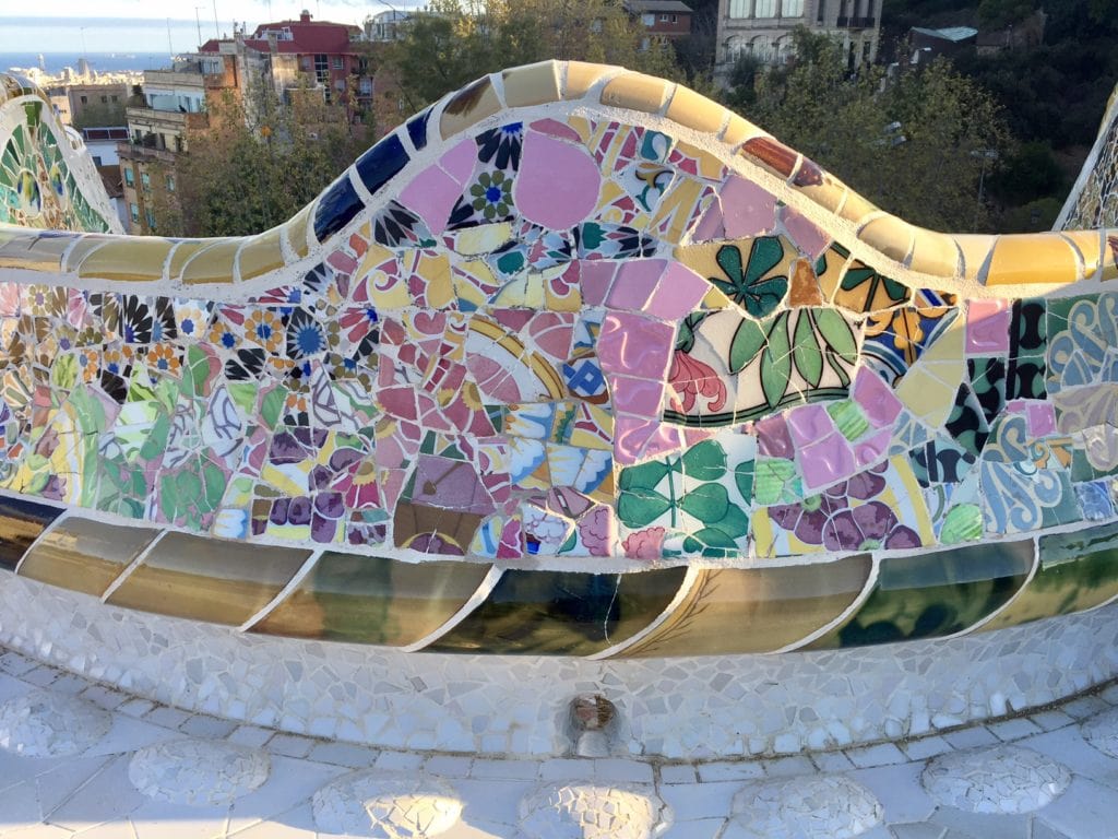 I was really impressed by the colorful mosaics in Park Guell. - "Why I Fell in Love With Gaudi in Barcelona" - Two Traveling Texans