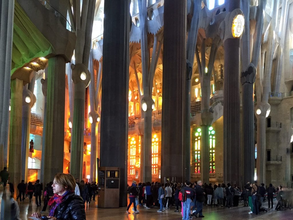 You can see the amazing light from the stained glass window. - "Why I Fell in Love With Gaudi in Barcelona"