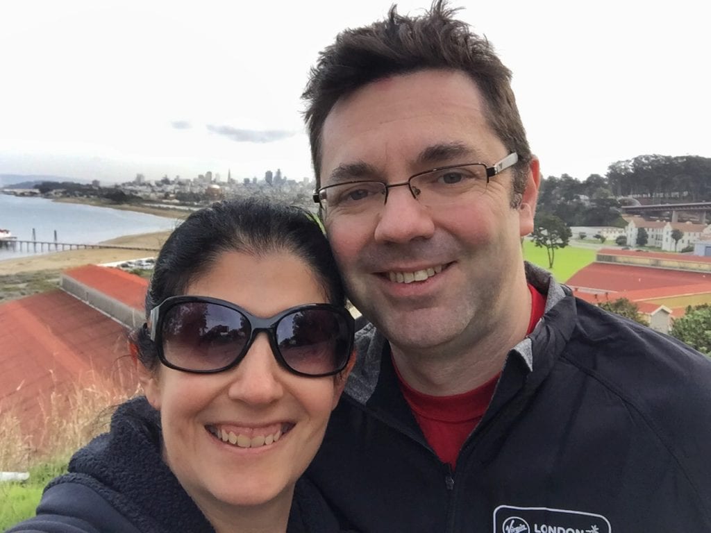 Obligatory selfie we took in Sausalito. You can see San Francisco in the background.- Biking Across the Golden Gate Bridge: Another off my Bucket List!" - Two Traveling Texans